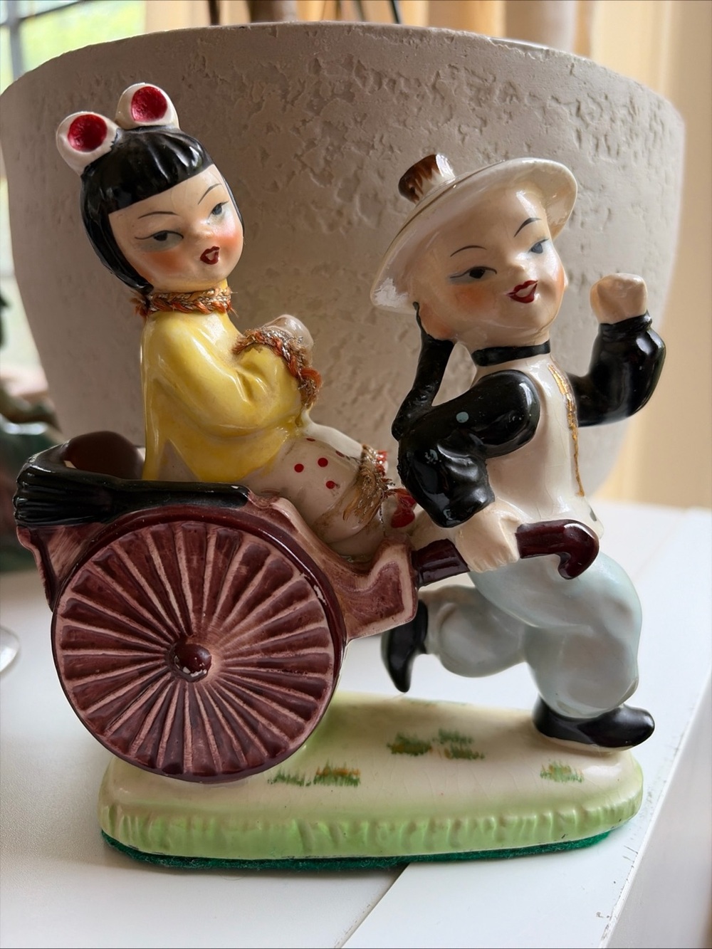 Vintage boy & girl with rickshaw 1950s